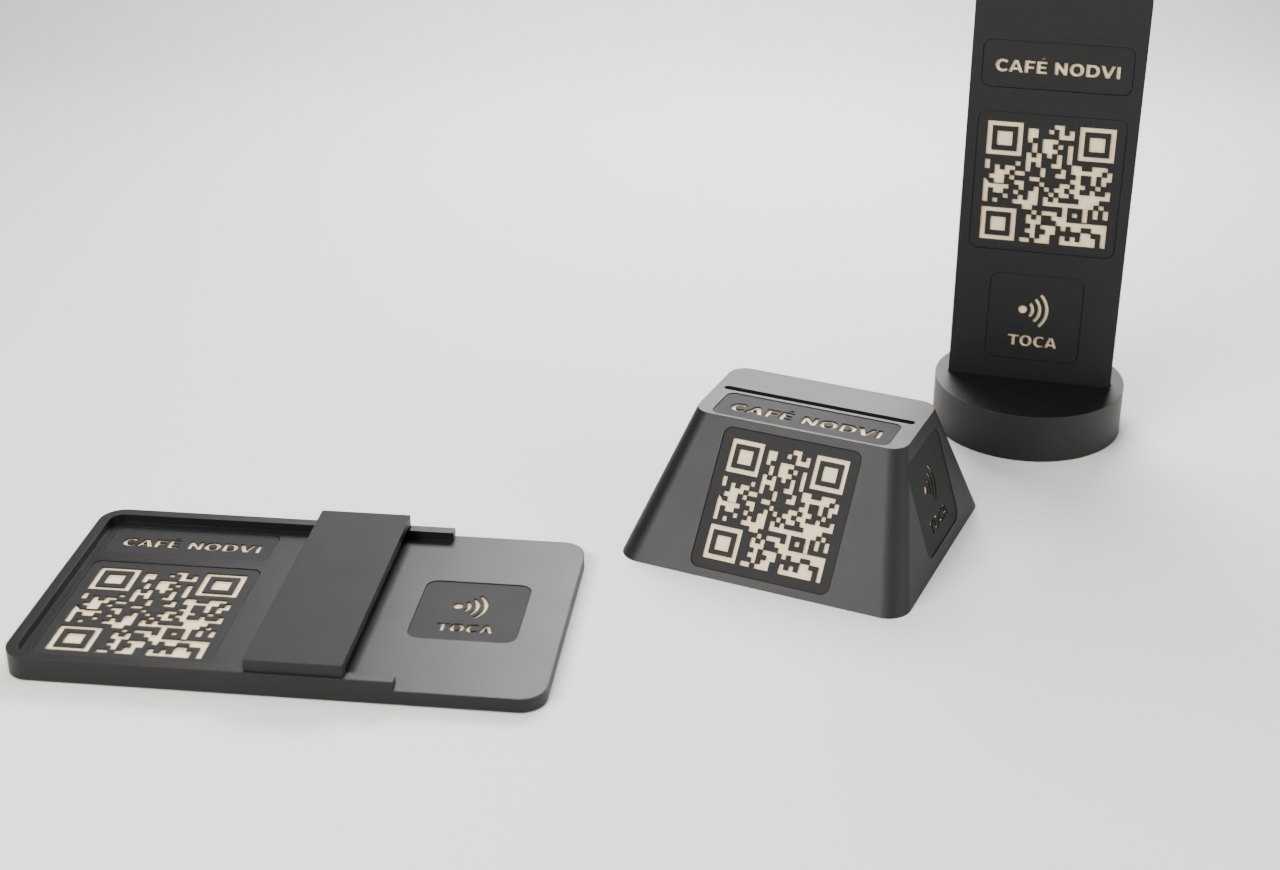 Piezas NODVI en PETG negro con código QR y NFC grabados en crema